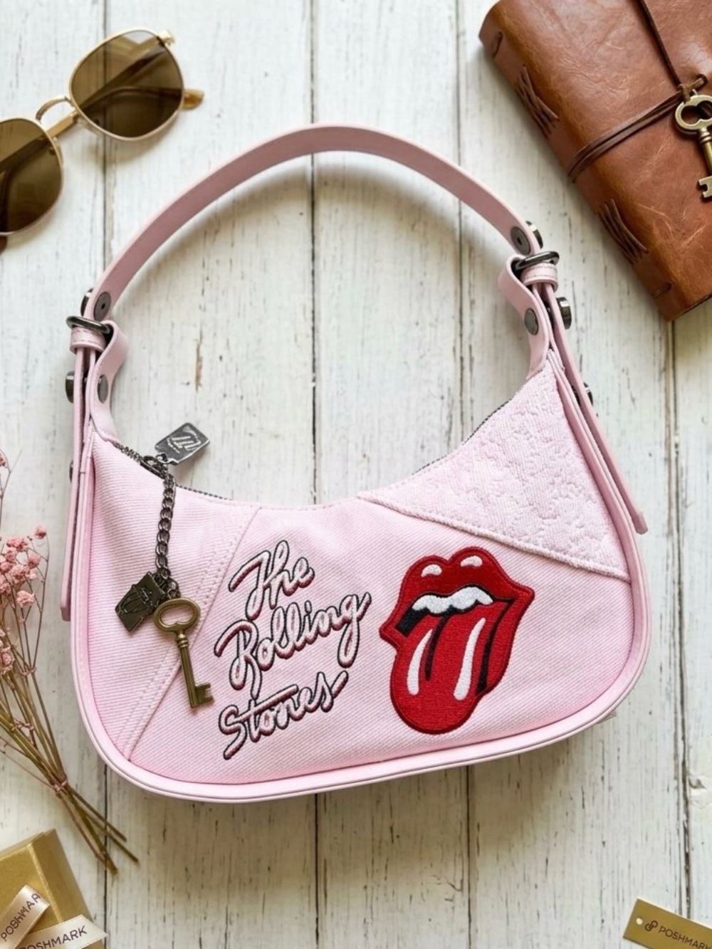 the Rolling Stones Pink Logo Shoulder Bag with Embroidered Tongue